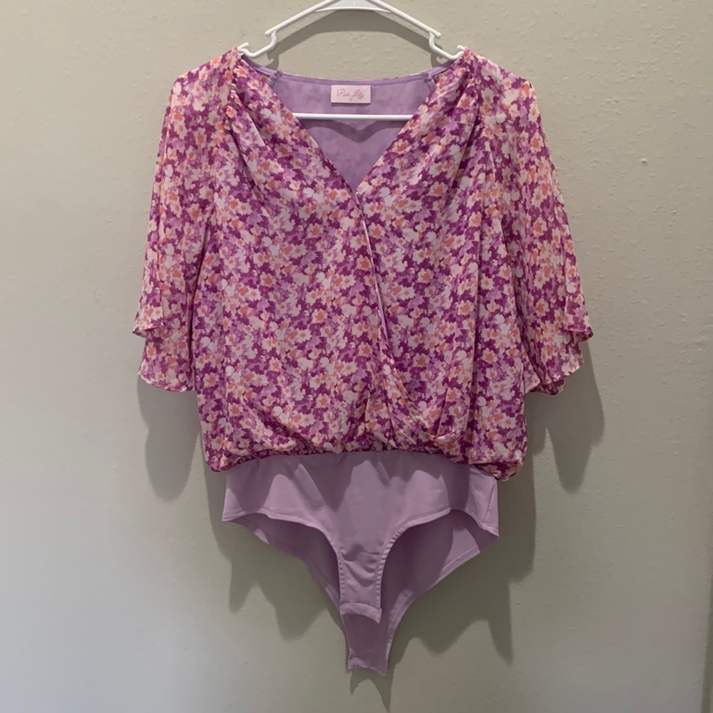 A Forever Tradition Purple Floral Wrap Bodysuit